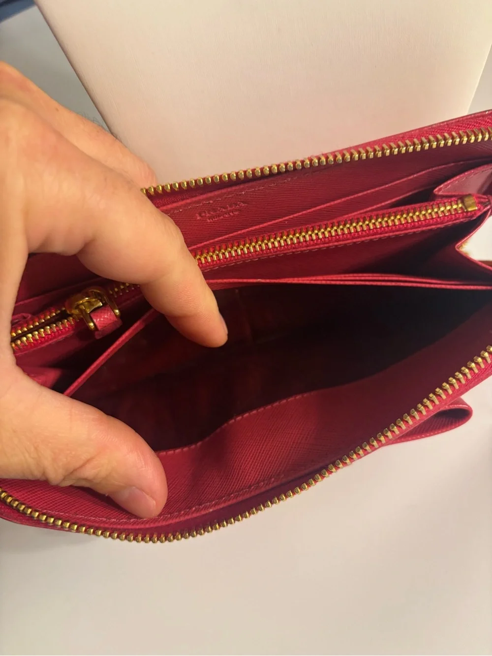Prada reddish pink Saffiano Zip-Around Wallet with Bow Detail